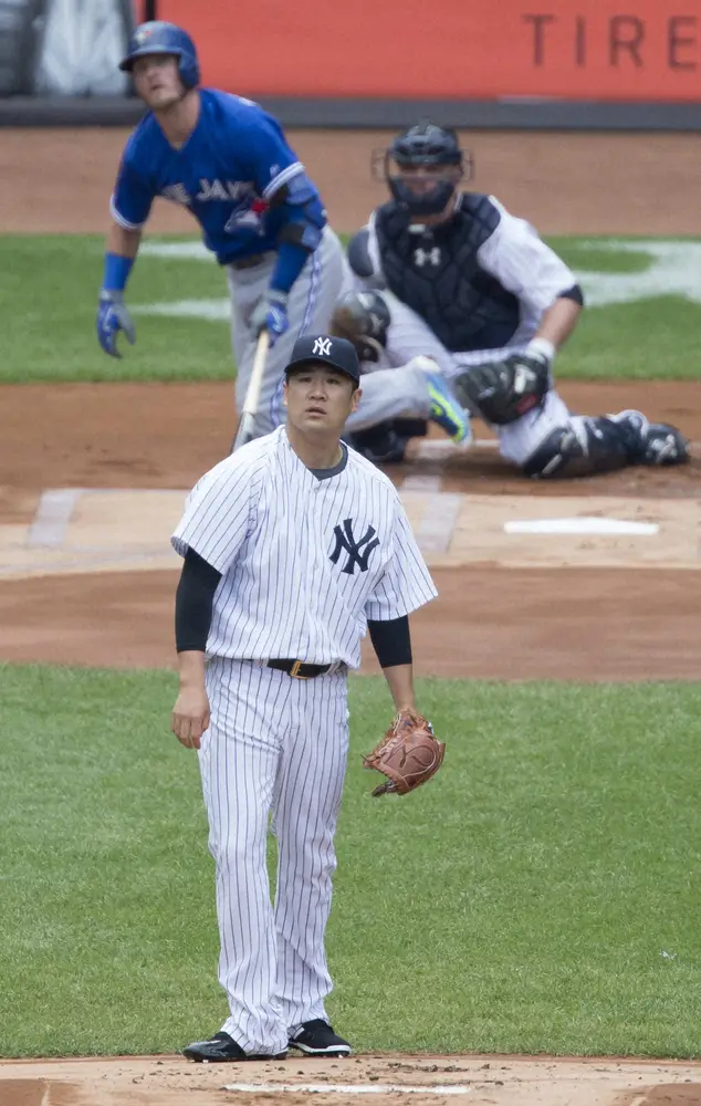 ジョシュ・ドナルドソンに本塁打を浴びる田中将大（2015年8月撮影）