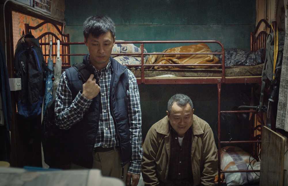 「誰がための日々」で父子を演じたショーン・ユー（左）
とエリック・ツァン　（Ｃ）　Ｍａｄ　Ｗｏｒｌｄ
　ｌｉｍｉｔｅｄ．