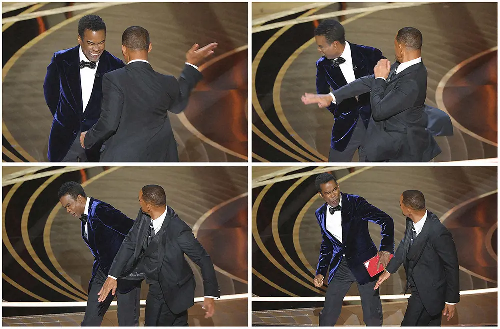 米アカデミー賞の授賞式でクリス・ロックを殴るウィル・スミス（連続写真）　（ロイター）