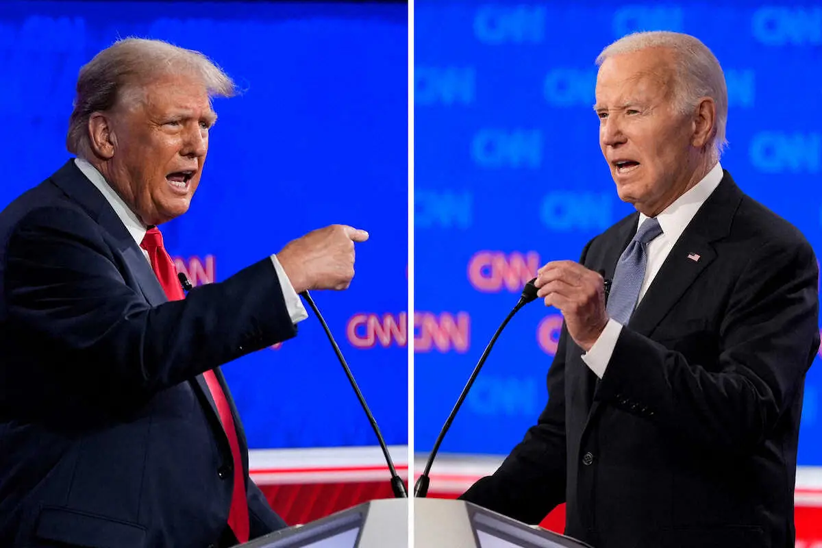 27日、米大統領選の候補者討論会に参加したバイデン大統領（右）とトランプ前大統領。互いを「史上最悪の大統領」と罵倒し合った＝ジョージア州アトランタ（AP）