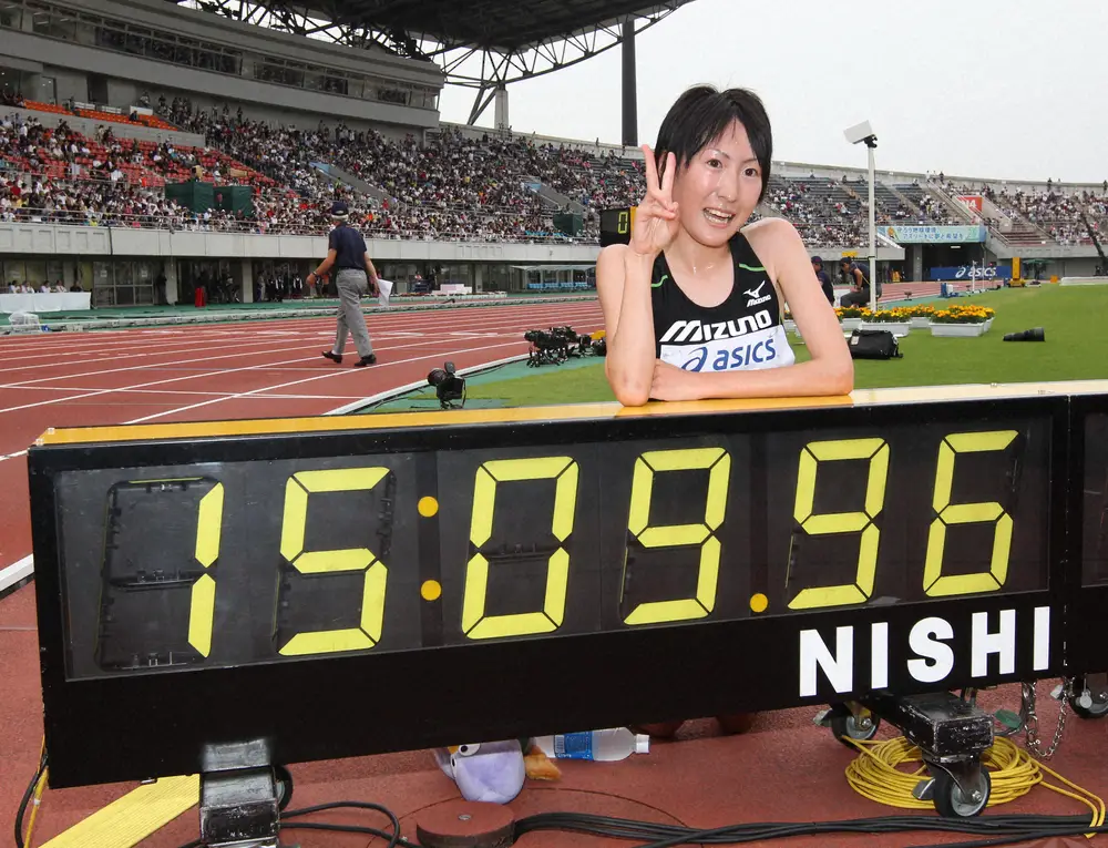 2011年、陸上日本選手権最終日で標準Ａ記録を突破して優勝した絹川愛