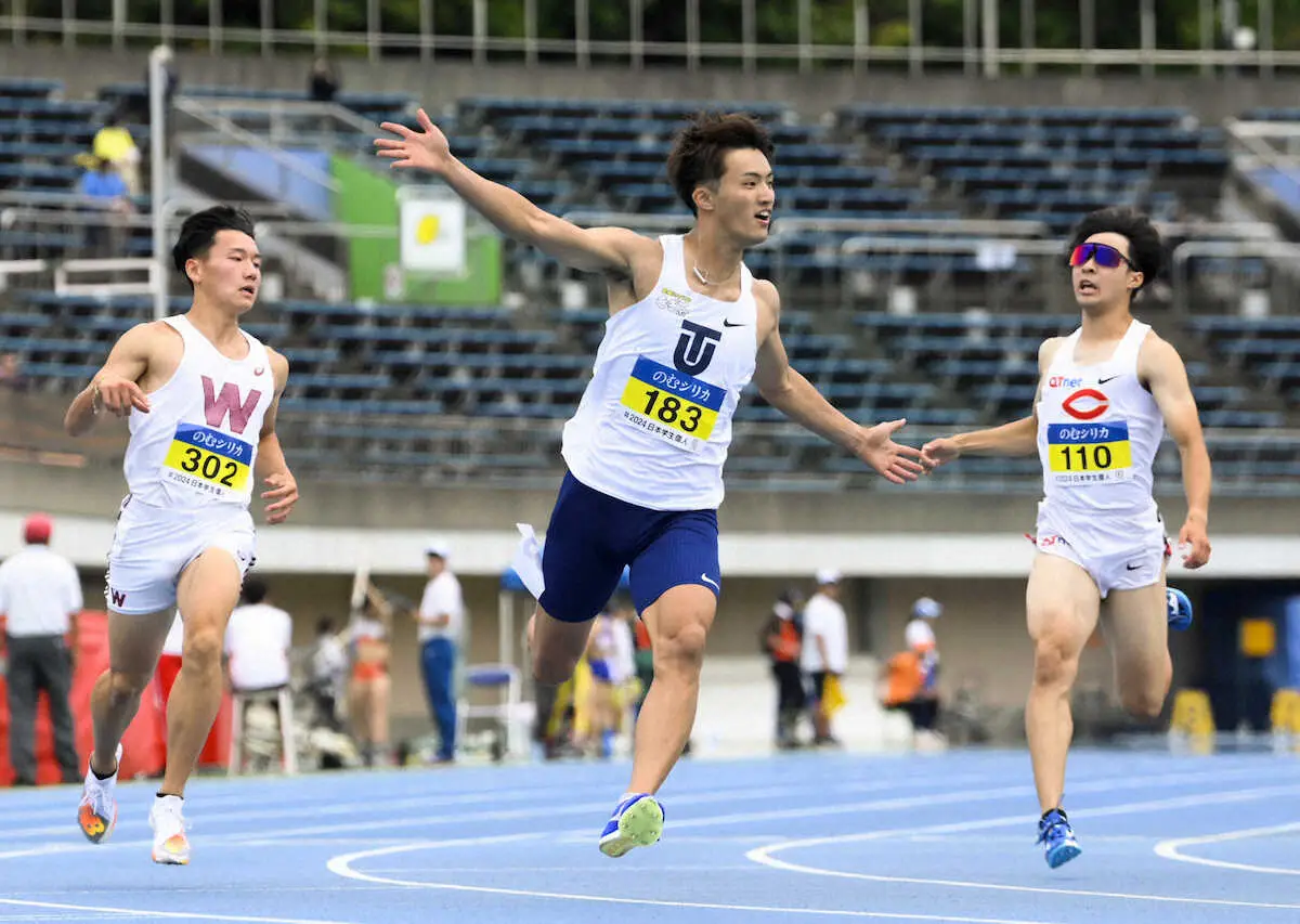男子100メートル準決勝で9秒97（追い風参考記録）をマークした柳田大輝（中央）