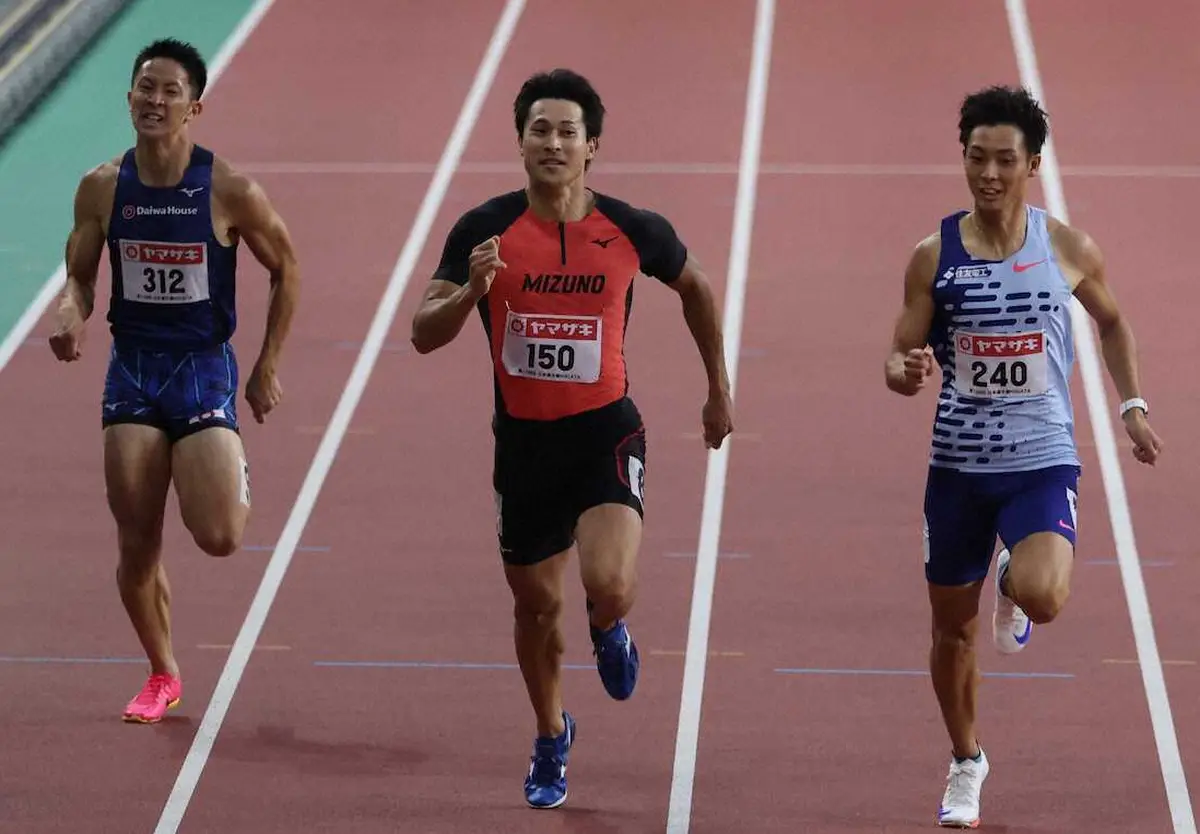 男子200m予選、1位通過した飯塚翔太（中央）（撮影・平嶋　理子）